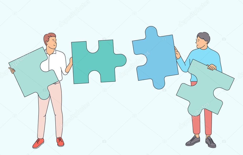 Teamwork, working together concept. Team of businessmen partners coworkers collect jigsaw puzzles finding solution together.