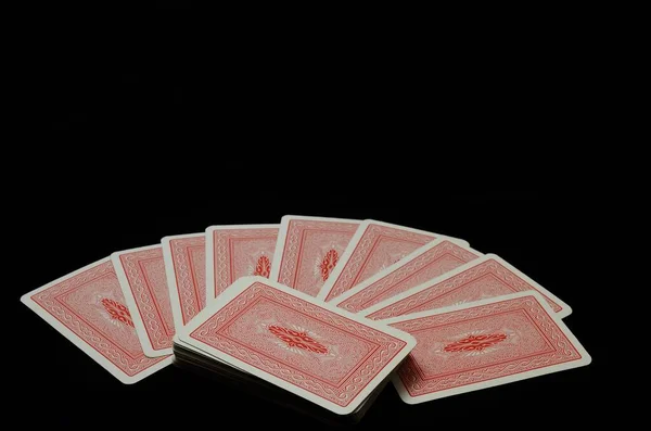 Photo Jeu Cartes Rouges Sur Fond Noir — Photo