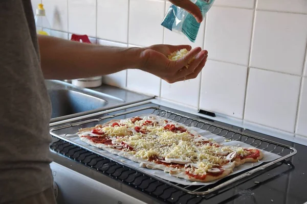 Man Putting Cheese Pizza Cooking Food Kitchen — Stock fotografie