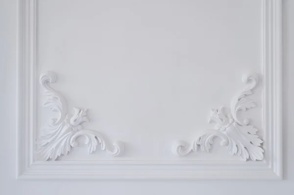 Luxury white wall design bas-relief with stucco mouldings roccoco element Royalty Free Stock Photos