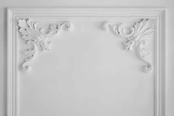 Luxury white wall design bas-relief with stucco mouldings roccoco element Stock Picture