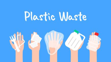 İnsan eli plastik çöp kamışı çatal bardak torbası şişesini tutuyor.