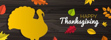 Şükran Günü bayrağınız kutlu olsun. Hindi kuşu silueti güz yaprakları ahşap arka plan çizimi üzerinde.