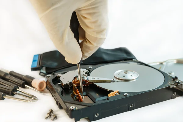 Screw hard disk drive to repair for recovery information — Stock Photo, Image