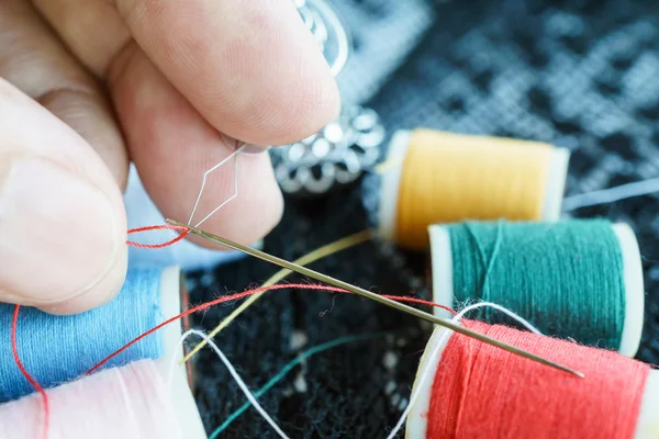 Closeup colorful thread and needle — Stock Photo, Image