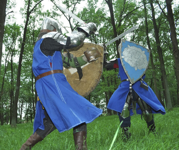 Battle of two knights in armor