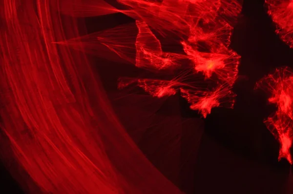 Fundo abstrato, o efeito da luz, vermelho — Fotografia de Stock