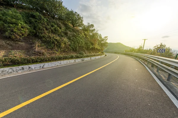 Kronkelende weg achtergrond china — Stockfoto