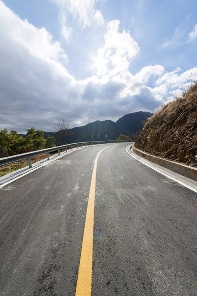 highway road with dramatic clouds