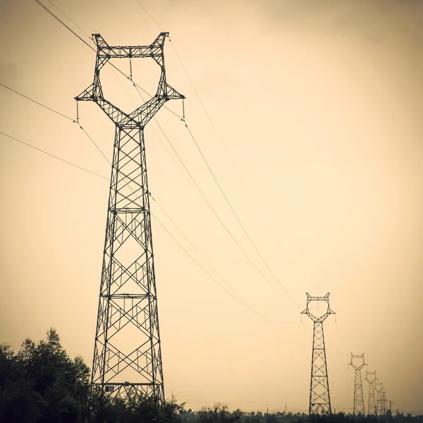 Electricity pylons on Sunset — Stock Photo, Image