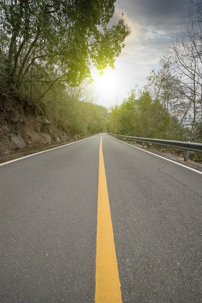 Kronkelende weg achtergrond — Stockfoto