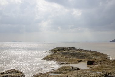 huge rocks in ocean water