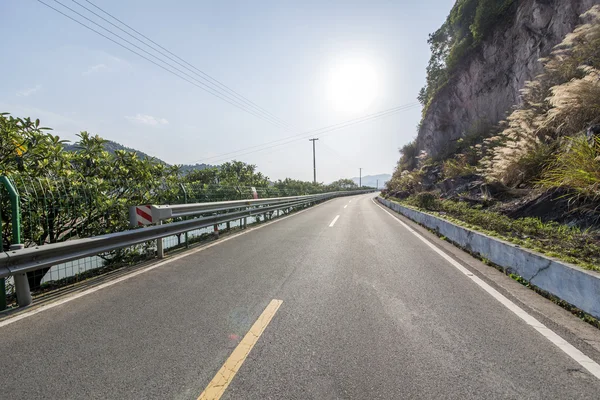 Kronkelende weg als achtergrond — Stockfoto