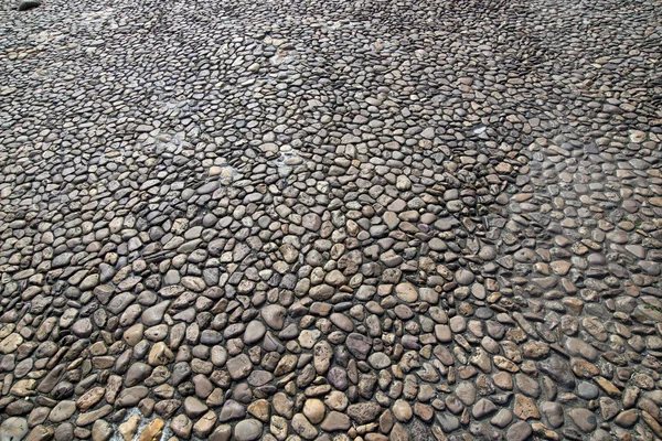 Cobblestone chão como fundo — Fotografia de Stock