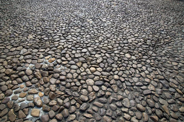 Cobblestone ground as background — Stock Photo, Image