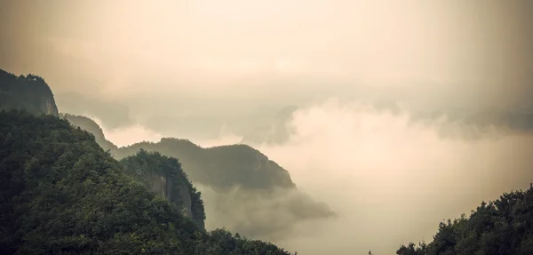 Sunrise in mountains with fog — Stock Photo, Image