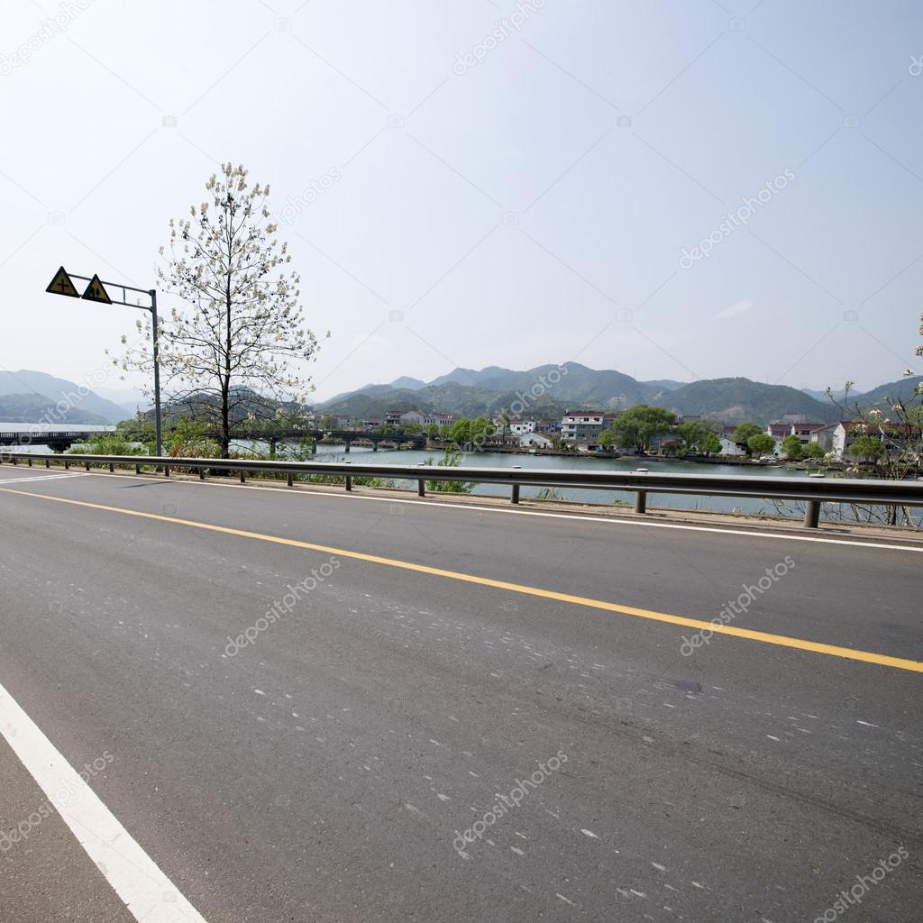 Highway road with lake view