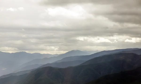 Road and mountain background — Stock Photo, Image