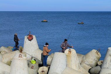 Balıkçılar bir çaça yakalamak