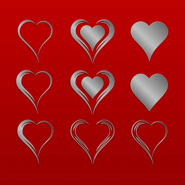 Set of nine simple isolated vector hearts with silver metallic pattern — Stock Vector