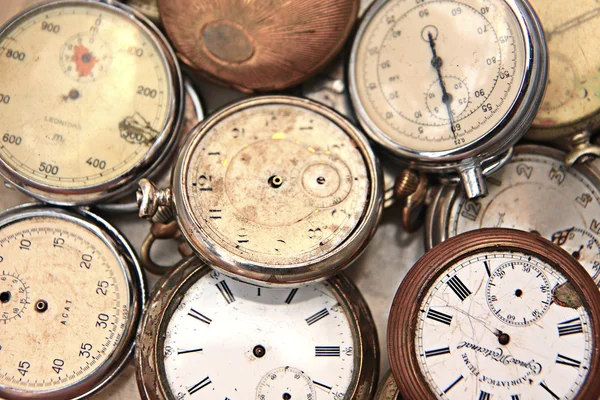 Old pocket watches at market for sale Royalty Free Stock Images