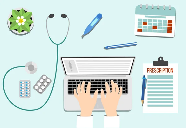Masadaki Tıbbi Aletlerle Bilgisayar 'da Çalışan Doktor