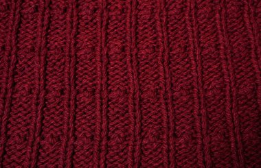                    Yün ipliğinden örülmüş kırmızı kumaş dokusu            