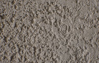 Travertin 'in duvarları grimsi bir dokudur.                