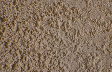          Travertin 'in duvarları sarımsı bir dokudur.                      