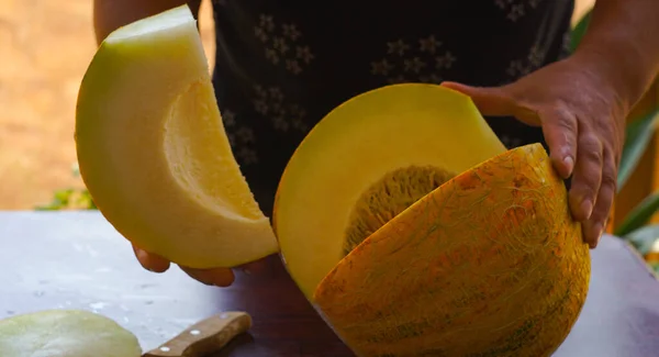 Melon is a juicy cooked melon, cut with a knife