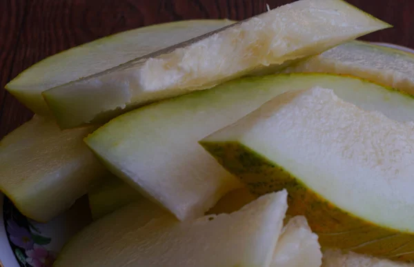 Melon is a juicy cooked melon, cut with a knife