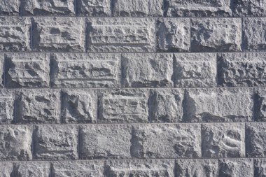 Granit bloklardan oluşan duvar arka plan gibidir.