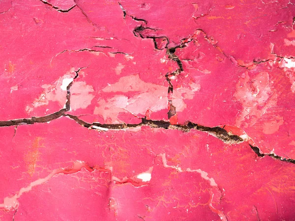 The red surface of the building is cracked abstract background. — Stock Photo, Image