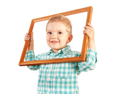 Kid hold wooden picture frame on white background