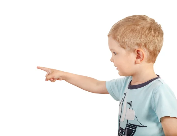 The boy points his finger towards