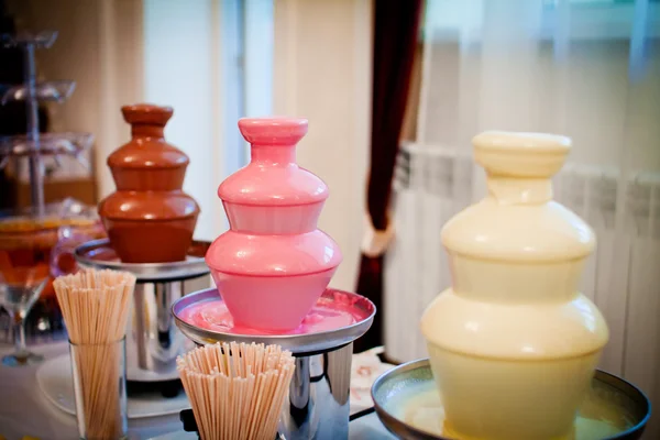 Chocolate fountain placed  in wedding day