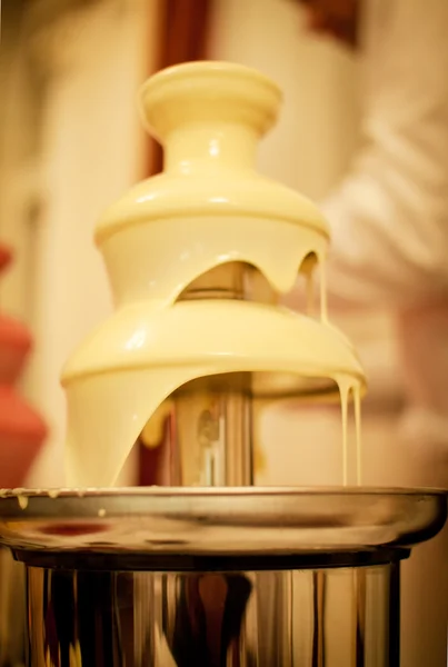 Chocolate fountain placed  in wedding day