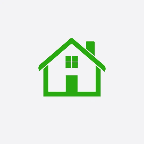 Beyaz arka plan üzerinde izole yeşil ev simgesini — Stok Vektör