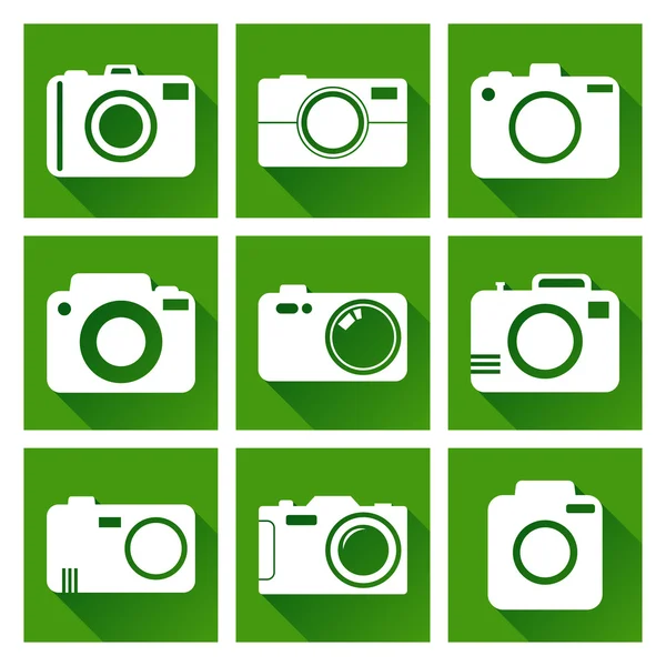 Icono de la cámara sobre fondo verde con sombra larga. Ilustración vectorial en estilo plano con iconos de fotografía . — Vector de stock