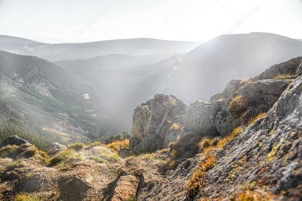 fog in the mountains at sunrise , Mist on hills in morning landscape 