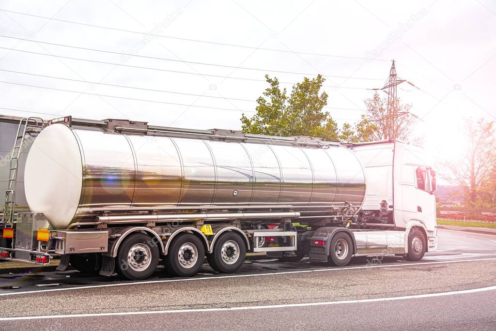 A big fuel tanker truck ,  on the roads of Europe . Logistics and transportation