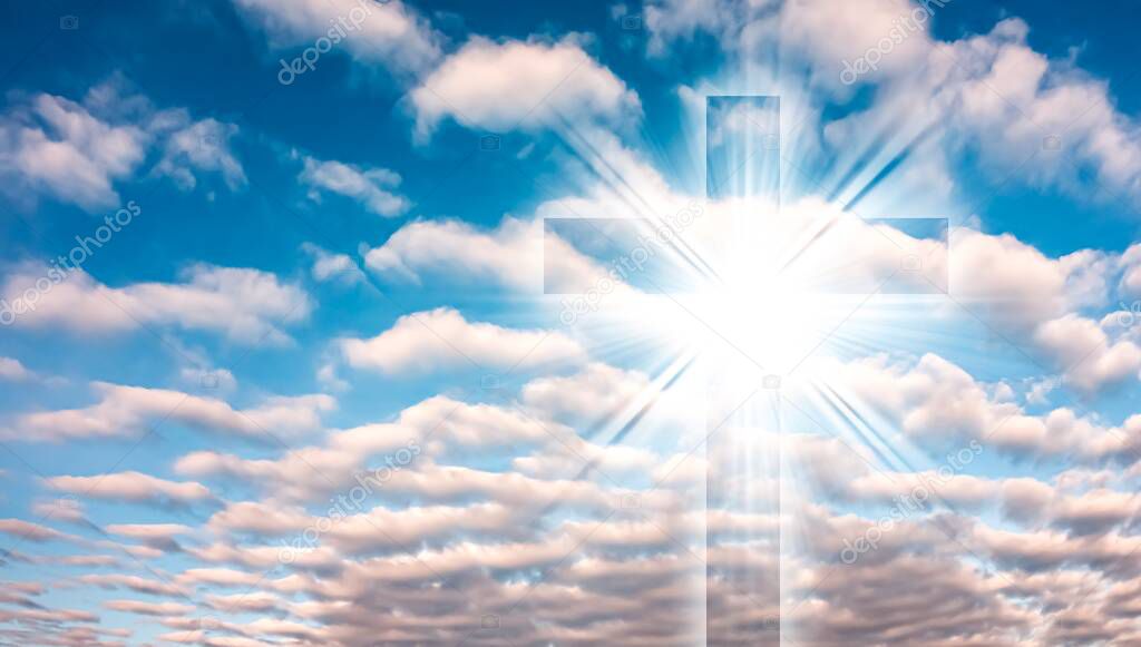 The cross of God in the rays of the sun. Background of religions . sunny day