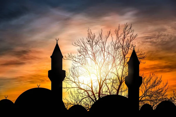 Ramadan background, fabulous mosque , silhouette of the Mosque against the background of a colorful sky