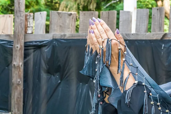 stock image women's hands in prayer, background of religion