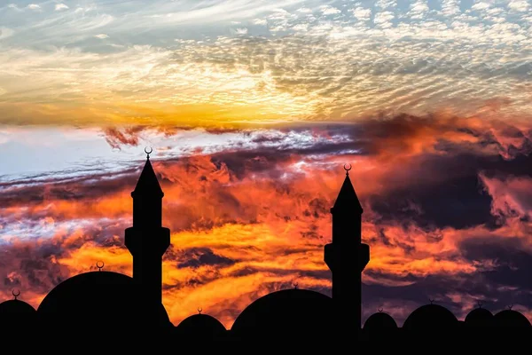 Ramadan background, fabulous mosque , silhouette of the Mosque against the background of a colorful sky