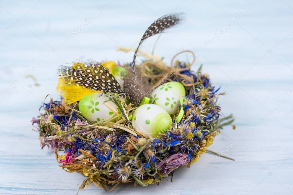 small bird eggs in the nest, Easter background