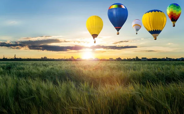 fly in a balloon, go in the air , beautiful balloons against sunset