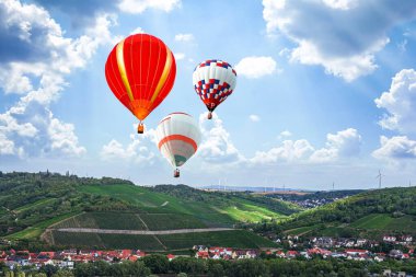 balloon in clouds against the sky