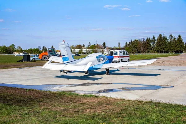 Small plane preparing for take-off , training flight on two local aircraft