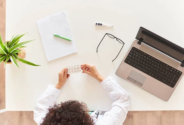 Top view of a doctors desk table in a female doctors office — Stock Photo, Image